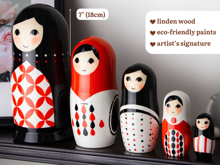 Wooden nesting dolls black and red pattern