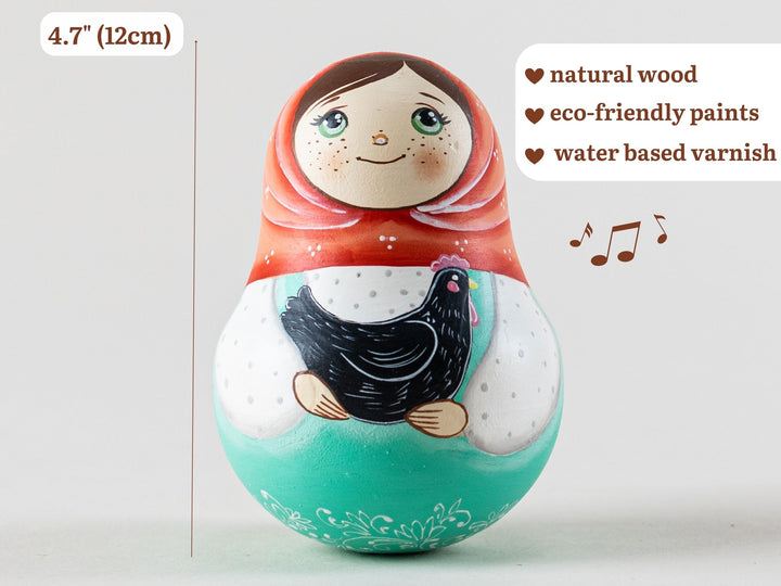 Musical roly-poly matryoshka with rooster