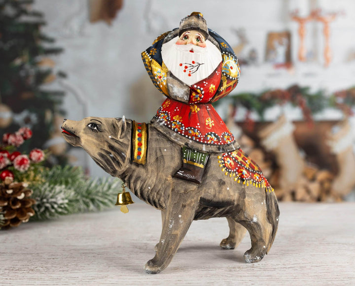 Hand-carved Santa Claus figurine on the wolf