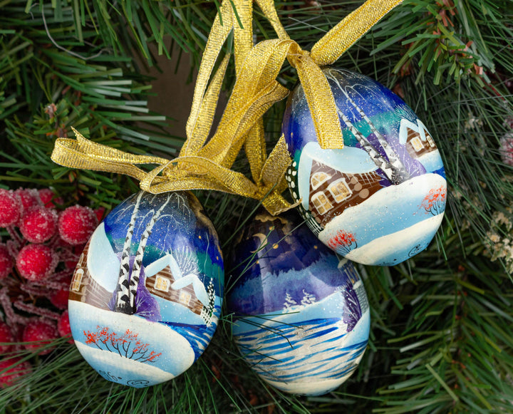 Wooden Easter eggs blue and white landscape